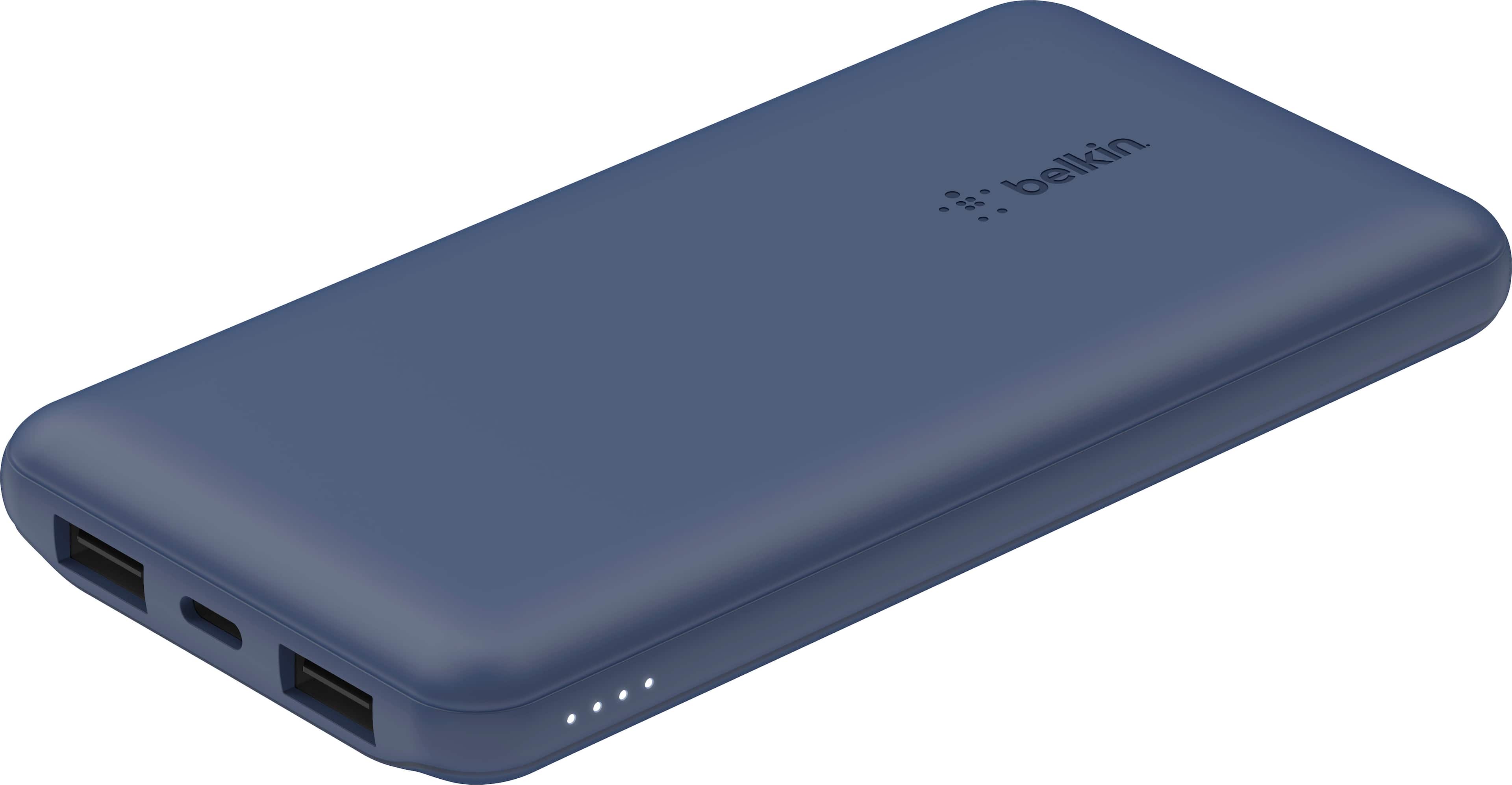 Belkin BOOST↑CHARGE 10K power bank being used on a coffee shop table with phone and tablet charging