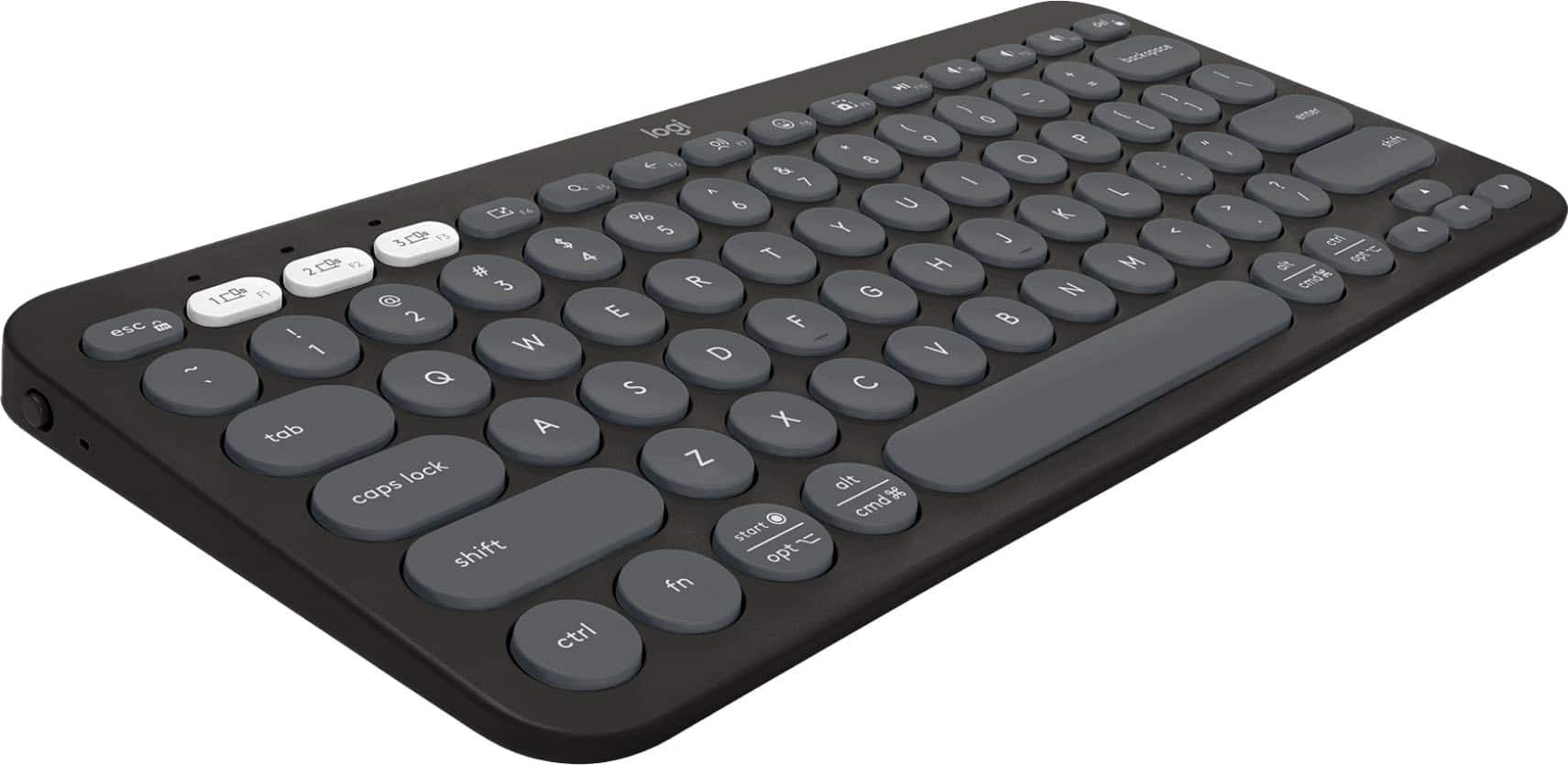 Logitech Pebble Keys 2 keyboard in use on a desk with multiple devices